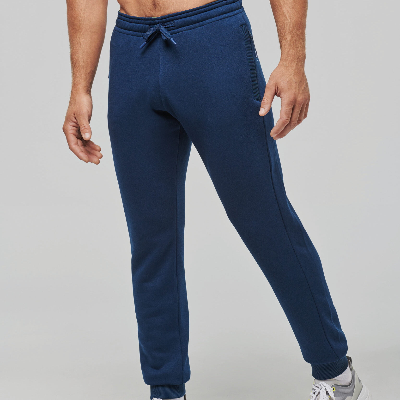 Multisport-joggingbroek met zakken volwassene